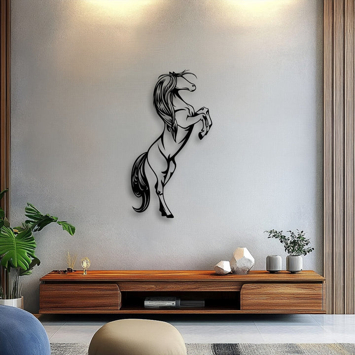 A textured gray wall, lit from above, with wooden panels, offers a clean background for the unique metal wall art.