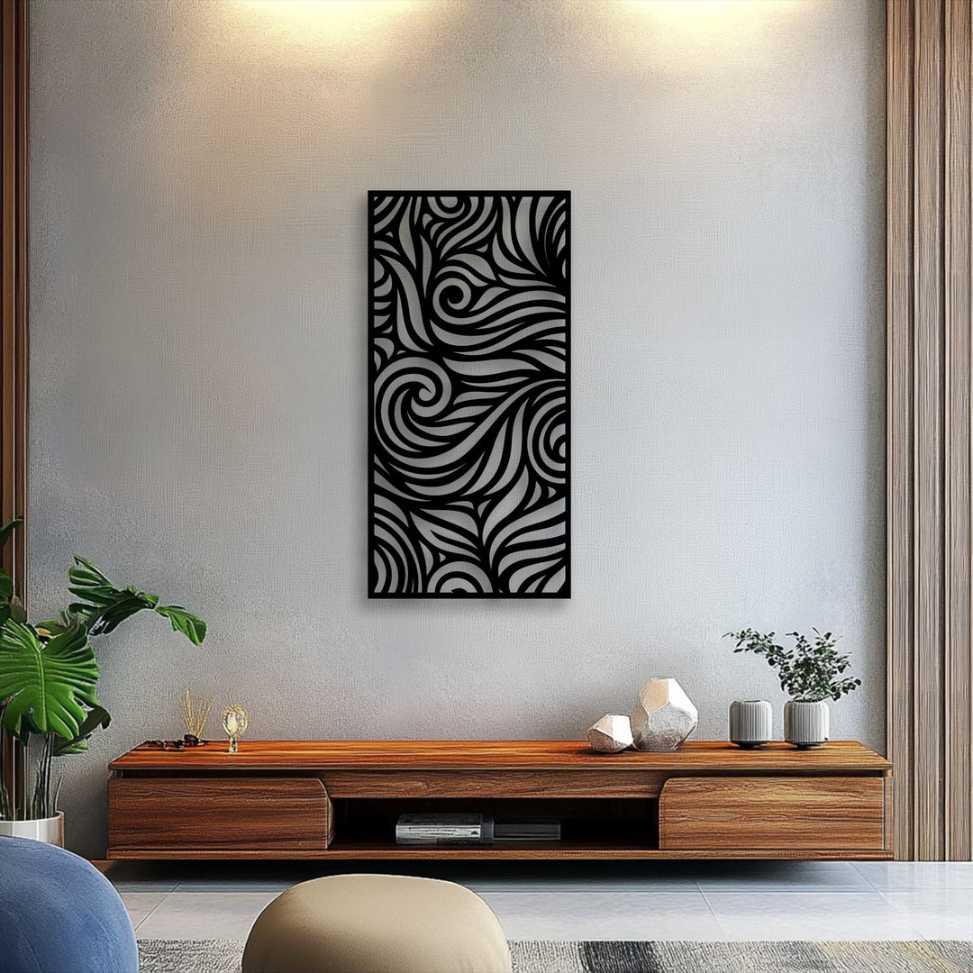 The focal point showcases an intricate black abstract metal artwork featuring dynamic flowing swirl patterns, mounted on a textured light wall.