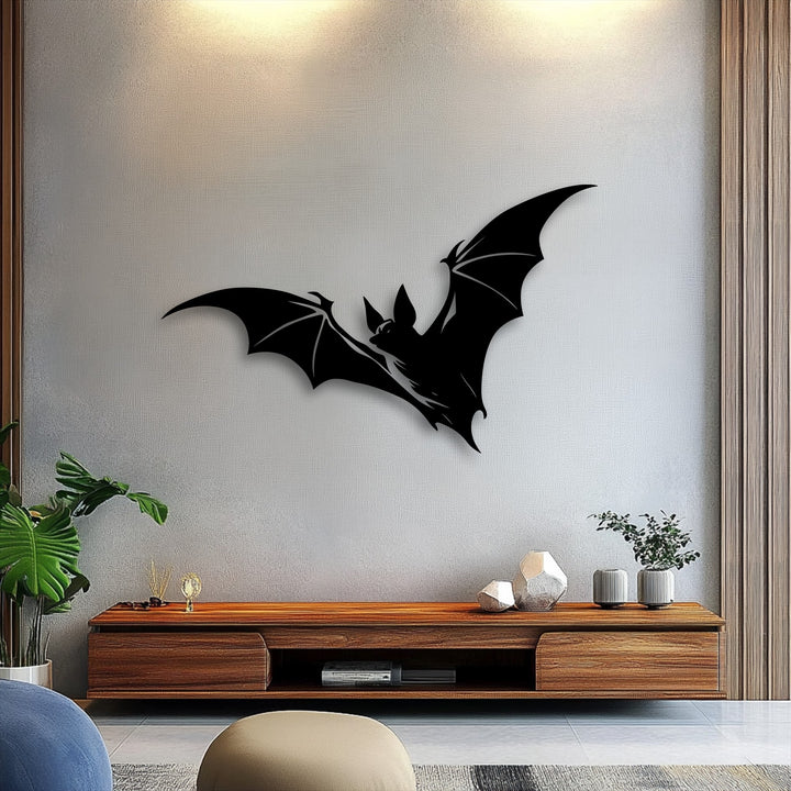 The visual rhythm of the flying bat silhouette gothic metal artwork creates a dramatic focal point above a rustic wooden console table.