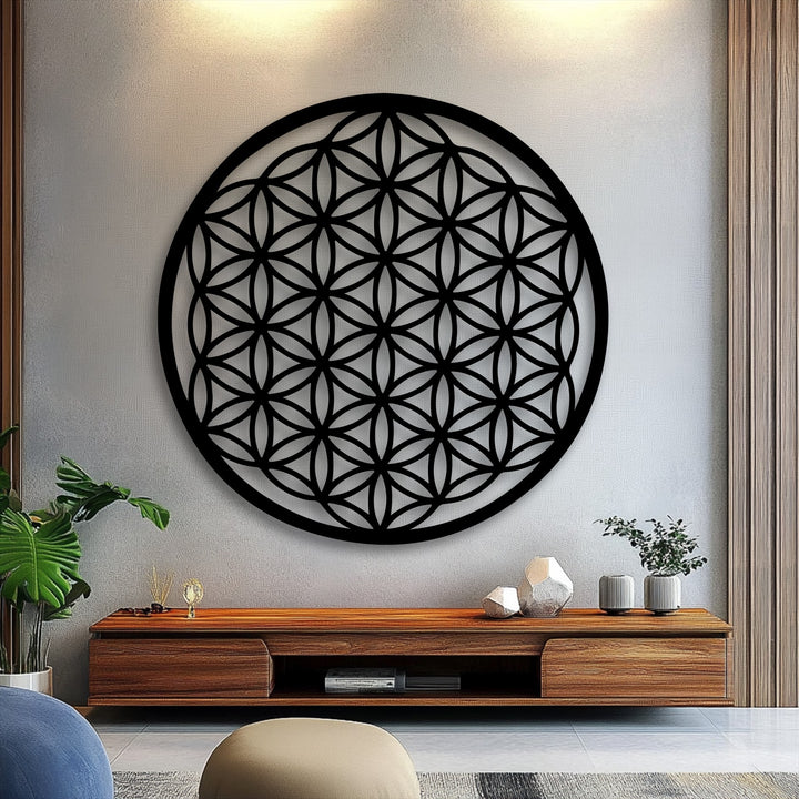 The intricate black Flower of Life metal wall art, a stunning piece of decorative metal art, presents a sacred geometry circle design.