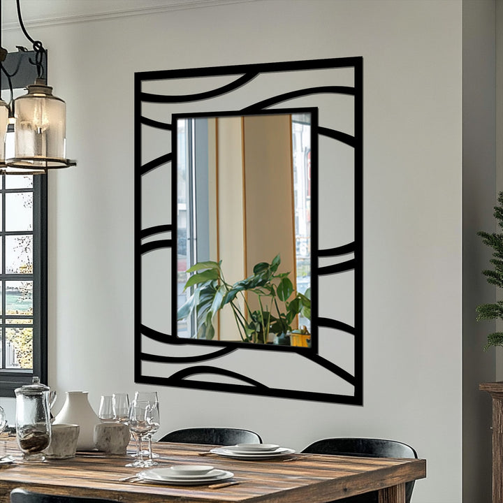 Against the light gray backdrop, the abstract wave frame metal wall mirror's sleek design offers a glimpse of the interior's decorative elements, complementing the unique metal wall art.