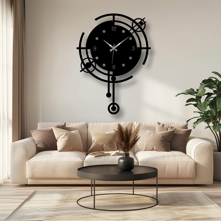 Understated color saturation enhances the modern orbit geometric metal art for wall clock's sleek black design, creating a minimalist statement piece.