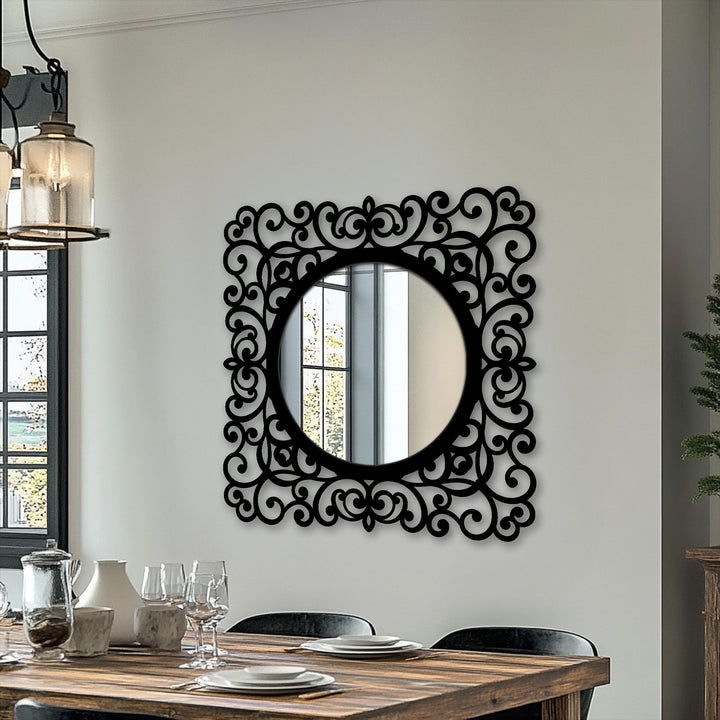 Highlighting the abstract quality, the baroque metal artwork of this scroll-framed, round mirror for wall decor creates an intricate, swirling statement.