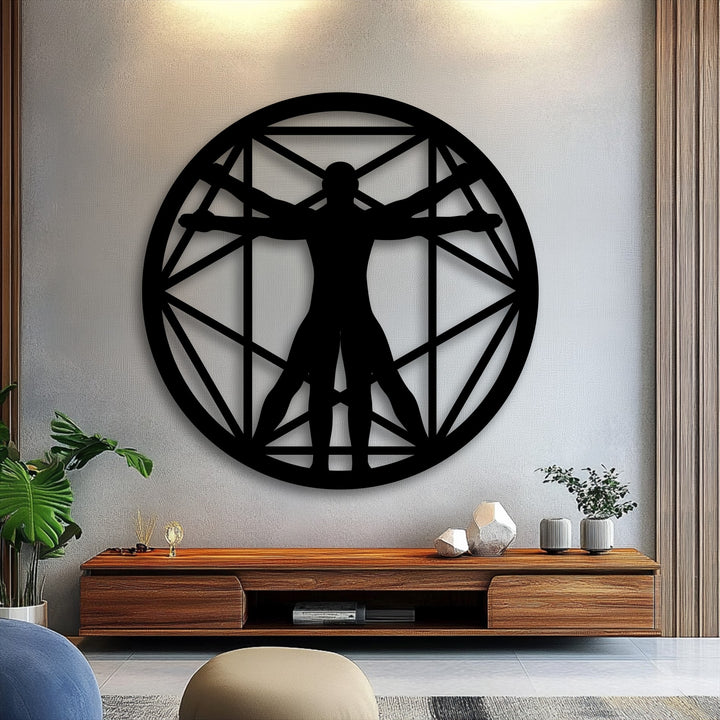 The organic form of the Vitruvian Man figure is elegantly displayed within a geometric circle metal decoration wall art piece.