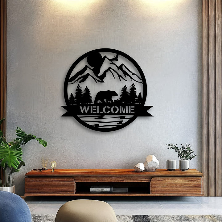 Pale gray wall serves as a backdrop for the impressive Mountain Bear Welcome Sign, a captivating nature landscape metal wall decor.
