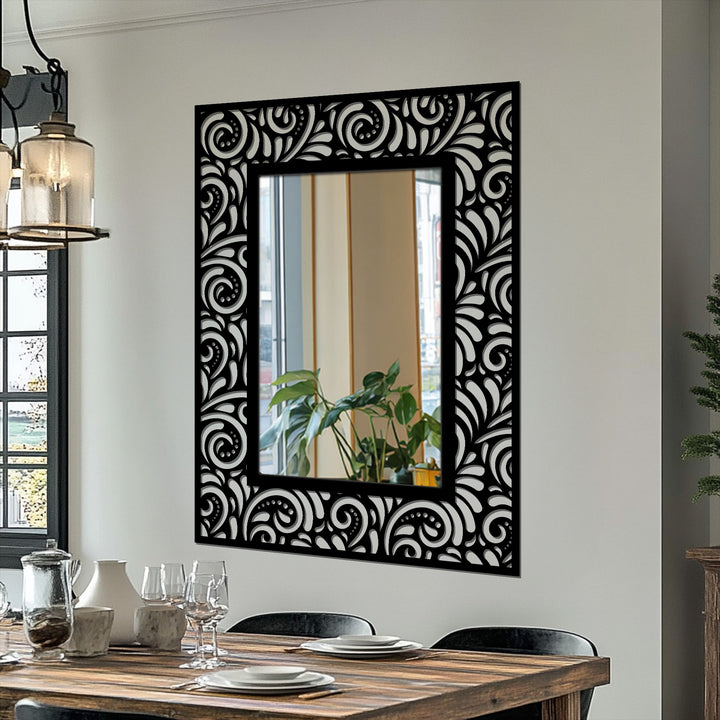 Contrasting the ornate frame with the clear reflection, this rectangular bathroom mirror features a bold transition between the black decorative metal art and the lighter space it reflects.