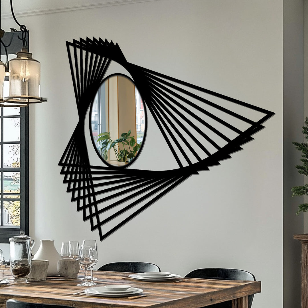Light and shadow play across the angular motion lines of this abstract geometric mirror, highlighting the impact of decorating with wall mirrors on the surrounding space.