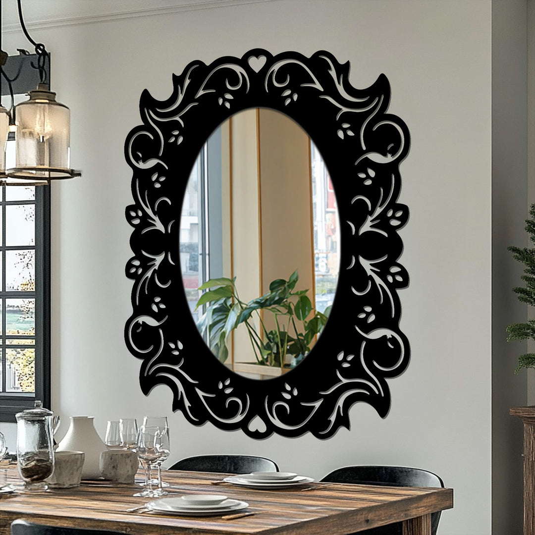 Layered black metal art for wall creates depth in this romantic oval mirror, with a decorative floral frame adding dimension to a modern mirror design.