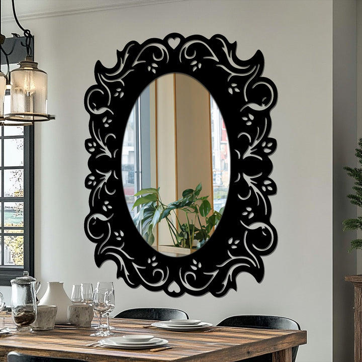 Layered black metal art for wall creates depth in this romantic oval mirror, with a decorative floral frame adding dimension to a modern mirror design.