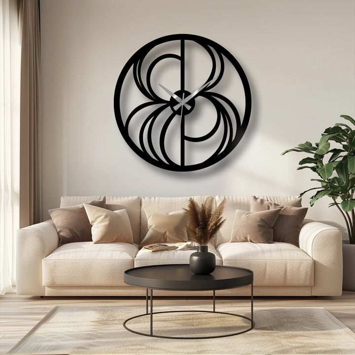 Textured surface of the black decoration wall art showcases an abstract swirl metal wall clock, a modern geometric timepiece with distinct lines.