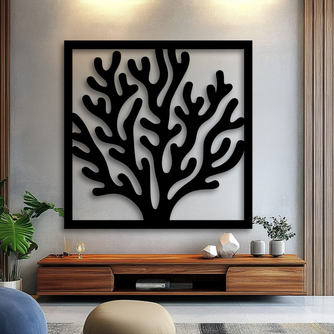 Striking black coral frame metal art for wall, showcasing its intricate ocean-inspired design against a light textured background.