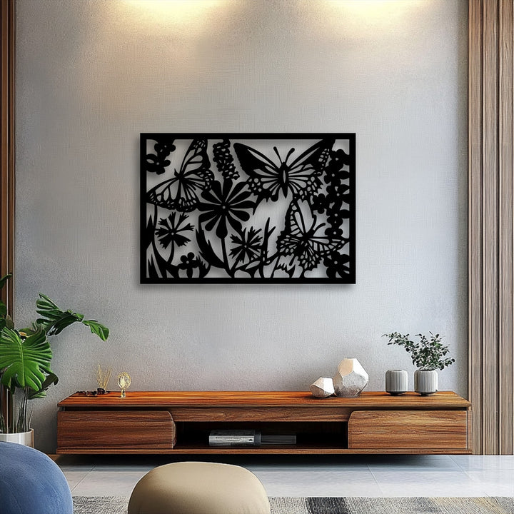 The organic forms of the intricate black butterfly and floral metal art for wall create a graceful nature silhouette panel.