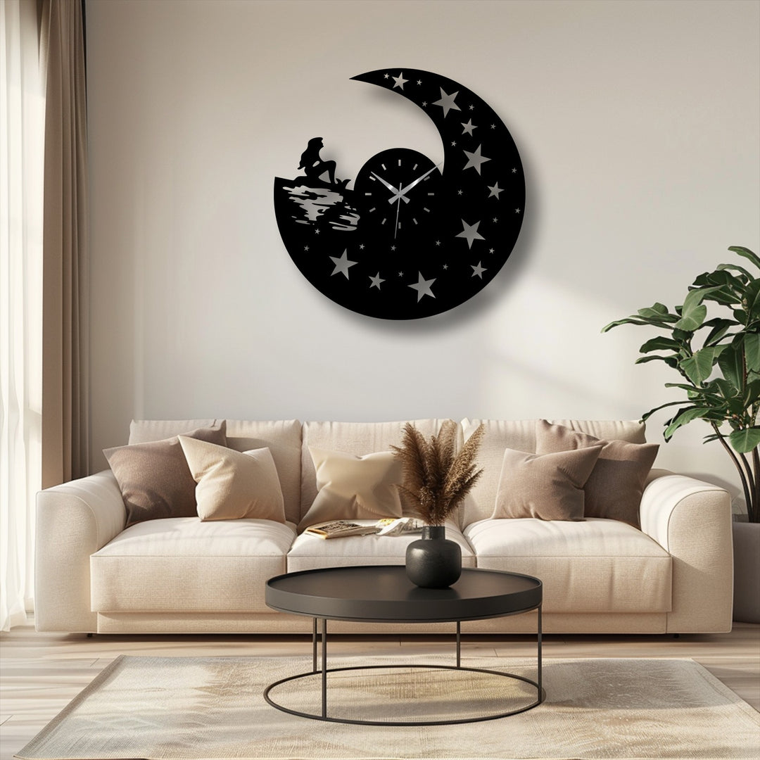 This celestial night design metal artwork clock showcases a dreamy mermaid and moon silhouette, making it a focal point with its unique charm and artistic details.