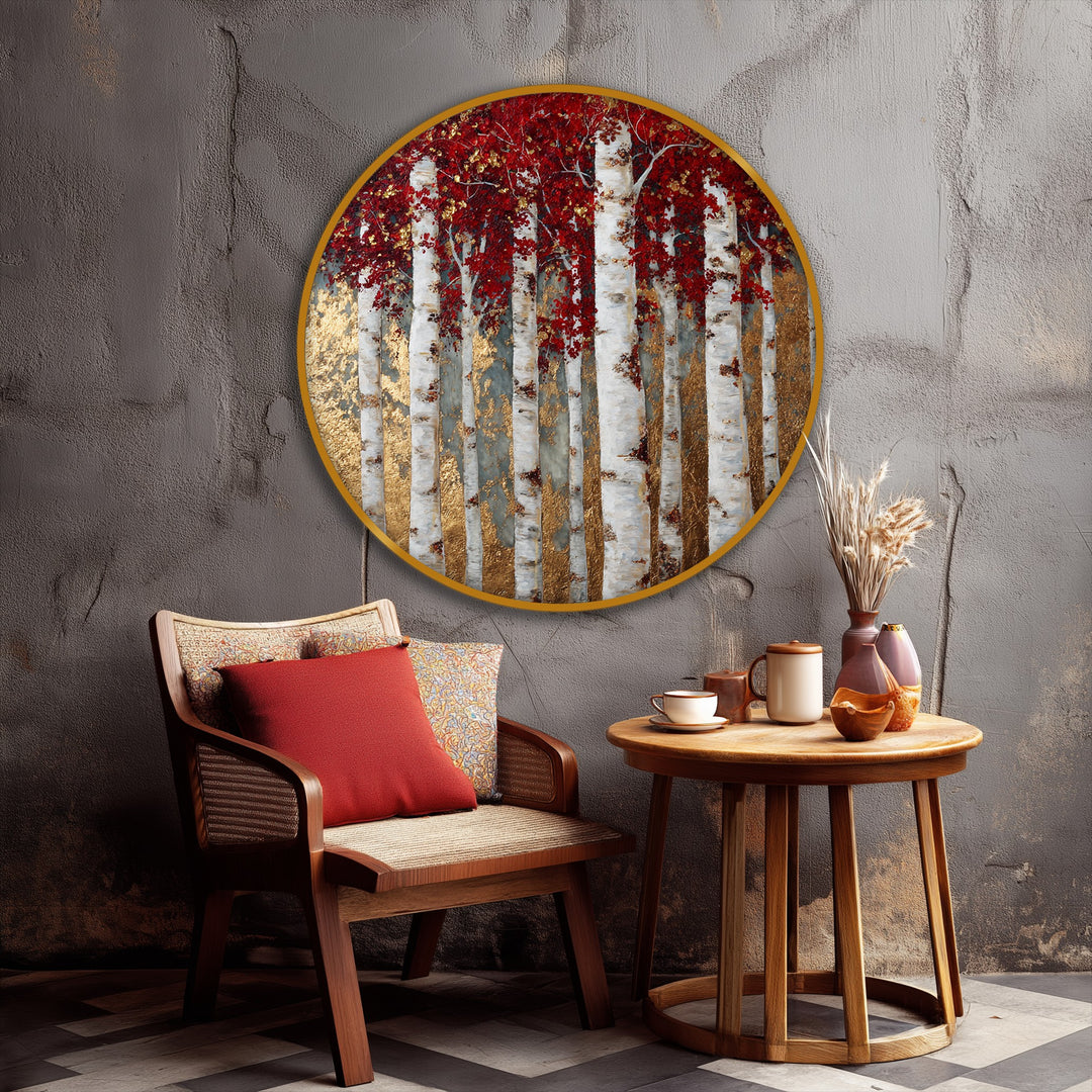 Vibrant color contrast defines this striking round canvas pictures print, showcasing a golden birch forest with vivid red leaves that pop against the textured gray wall.