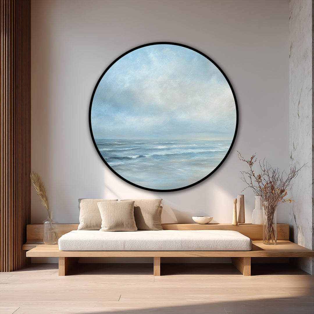 Cool color temperature washes over this modern oil painting art, depicting a serene seascape with light blue waves under a cloudy sky, creating a calming visual effect.