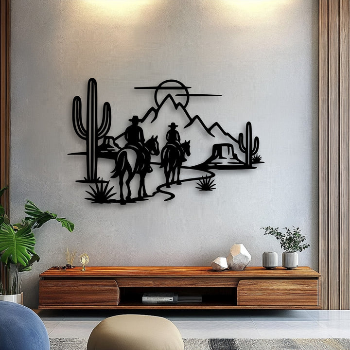 The stillness of the desert scene is captured in this unique metal wall art, featuring cowboy silhouettes riding past towering cacti.