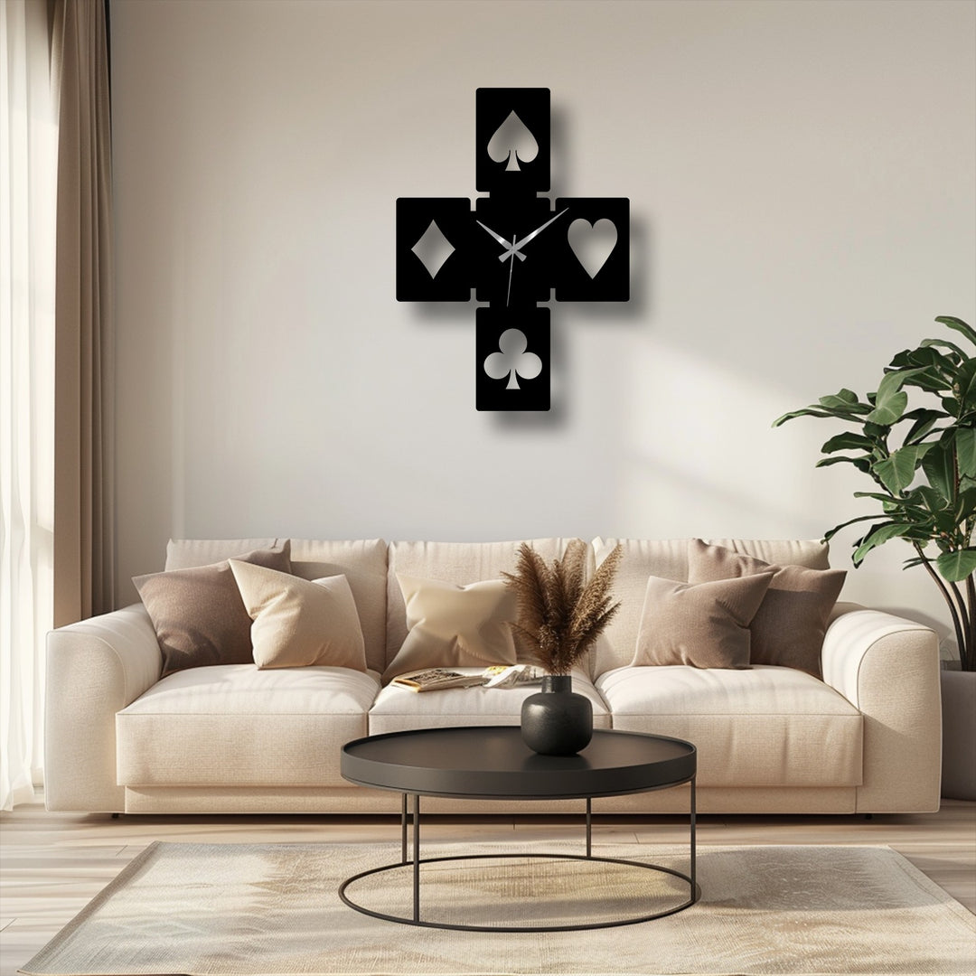 The precise, clean edges and defined borders of the black decorative metal art playing card symbols wall clock present a striking modern geometric design.