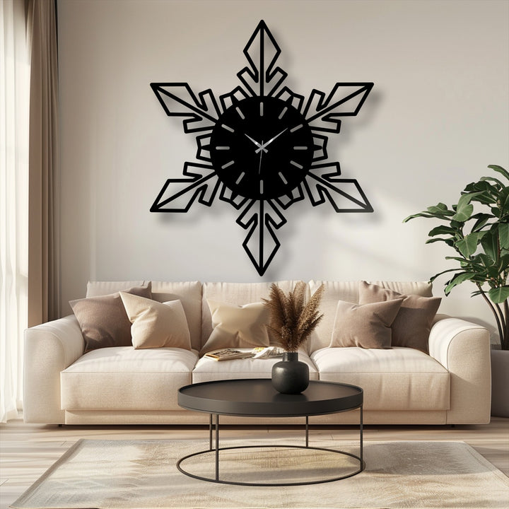Defined by its intricate cut-out edge and borders, this geometric snowflake design is a striking piece of metal wall decor in a modern clock.