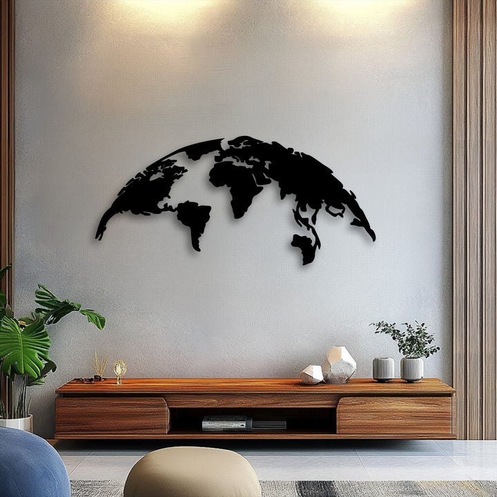 The distinct matte black finish of this decorative metal art world map creates a modern global silhouette for striking wall decor.