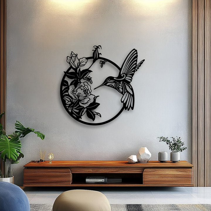 Observe the color transition: black hummingbird unique metal wall art sharply contrasts the light wall and warm console for visual depth.