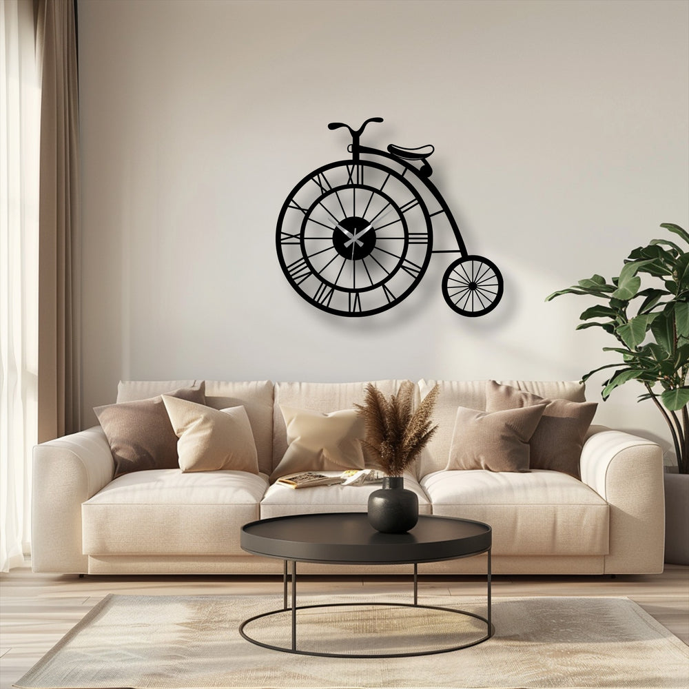 The darkest area defines the retro bicycle shape of this unique metal wall art clock, a decorative penny-farthing with Roman numerals perfect for cyclist enthusiasts.