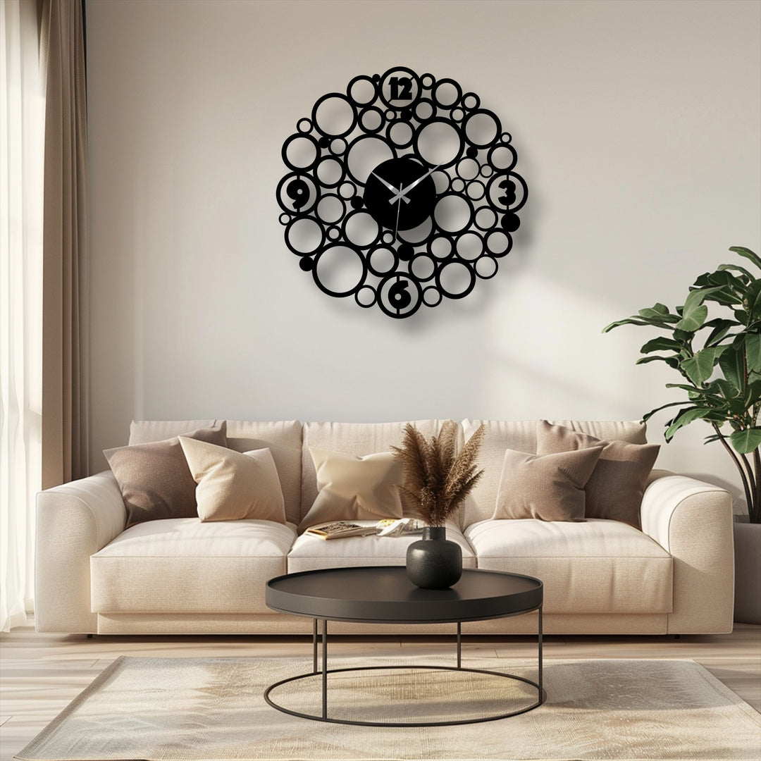 Black is the dominant color in this bubble circle metal art for wall clock, featuring a modern abstract design that stands out on the light wall.