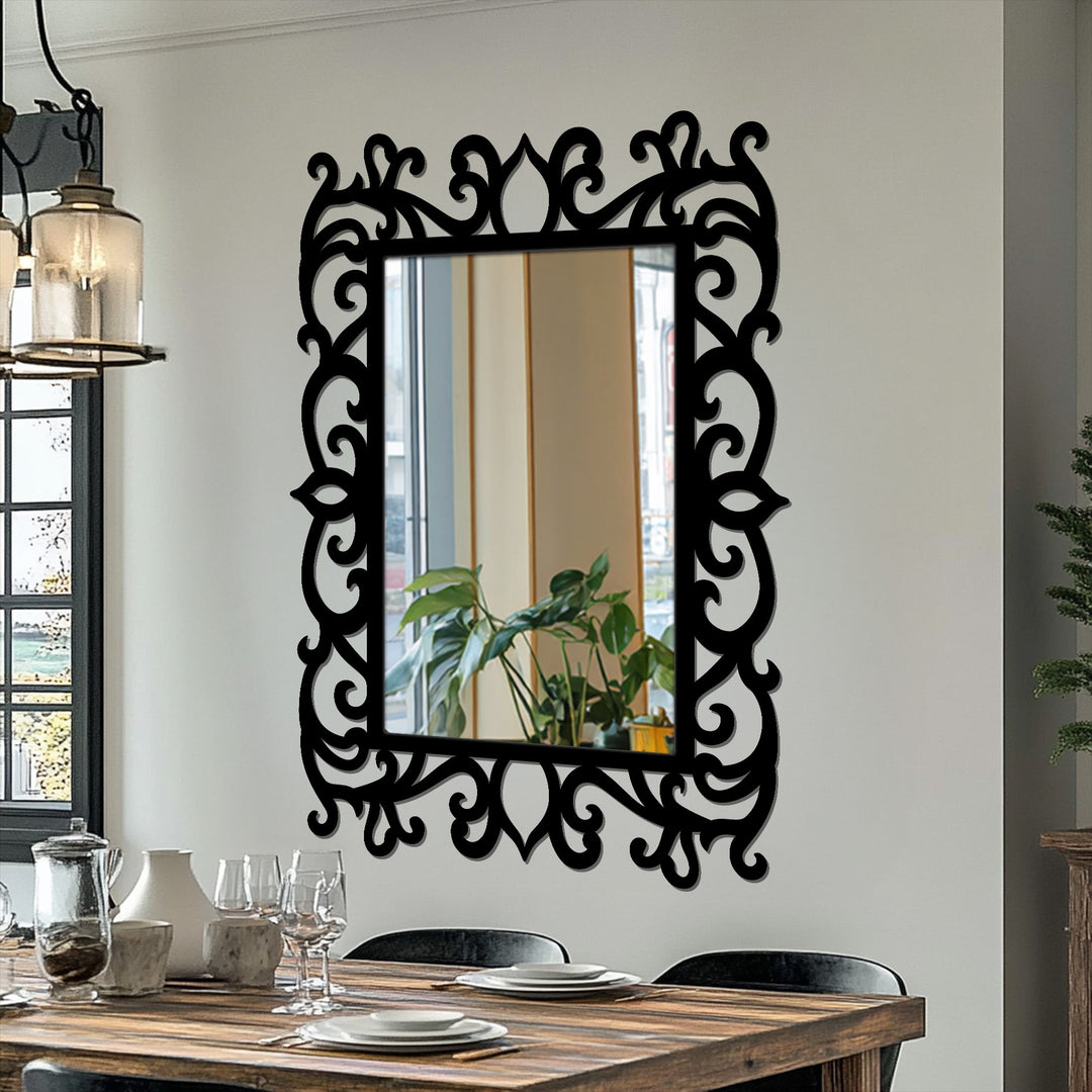 The elaborate floral scroll negative space of this black metal art for wall draws the eye around the mirrored surface of the ornate frame floor mirror.
