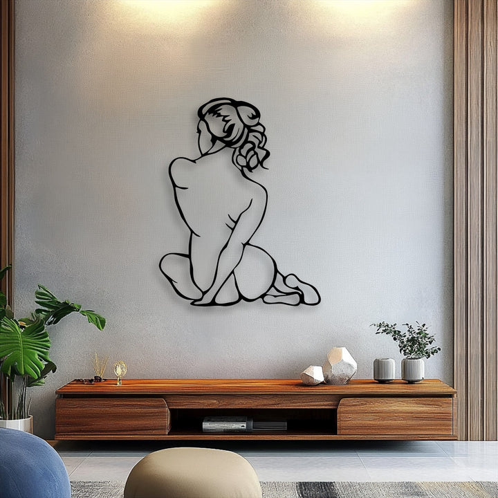The stillness of the minimal female figure unique metal wall art portrays a moment of serene reflection in its elegant silhouette.