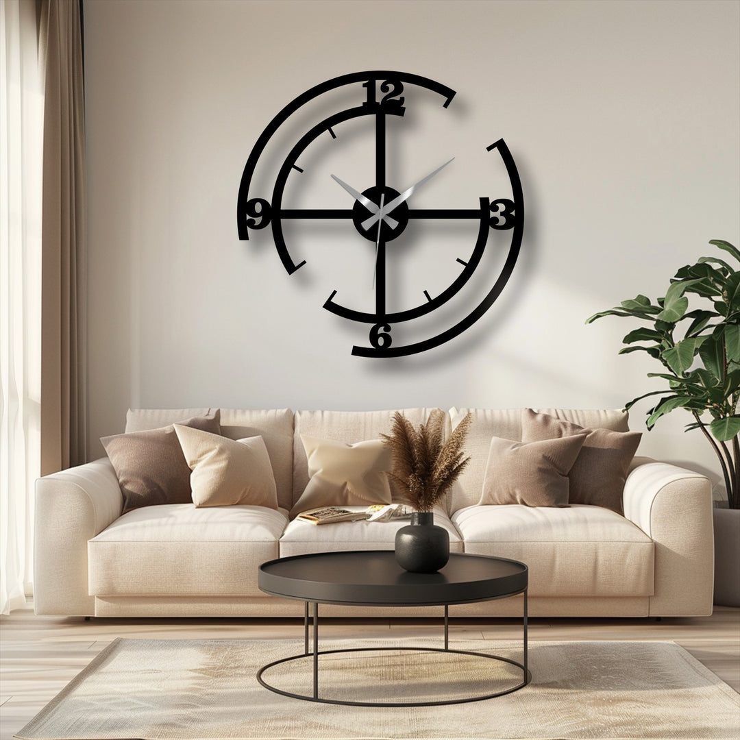 High color contrast emphasizes the black metal artwork of the modern geometric wall clock against the light cream backdrop, creating a striking, minimalist aesthetic.