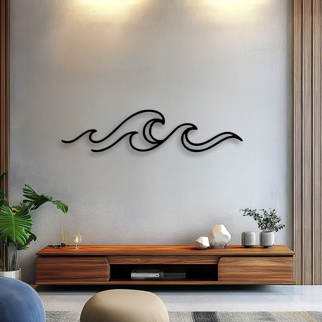Minimalist undulating lines of the black metal artwork create geometric waves, offering modern metal artwork decor above a console.