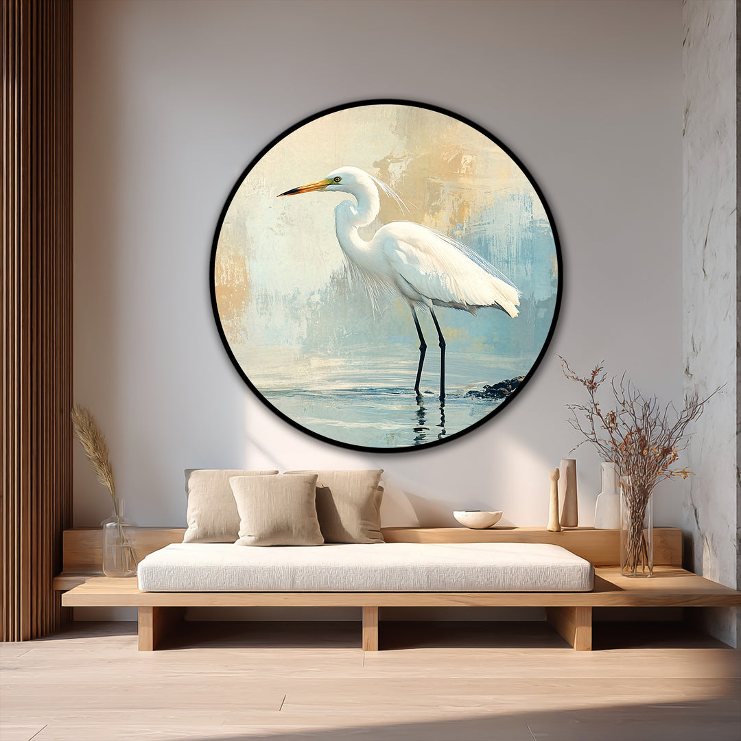 Encircling the serene coastal oil painting art piece of a white egret is a bold black circular border, enhancing the artwork's morning stillness.