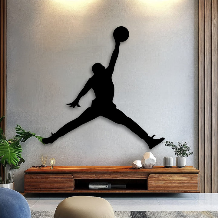 The abstract quality of a dynamic basketball player jump silhouette as striking metal wall decor on a light-toned wall.