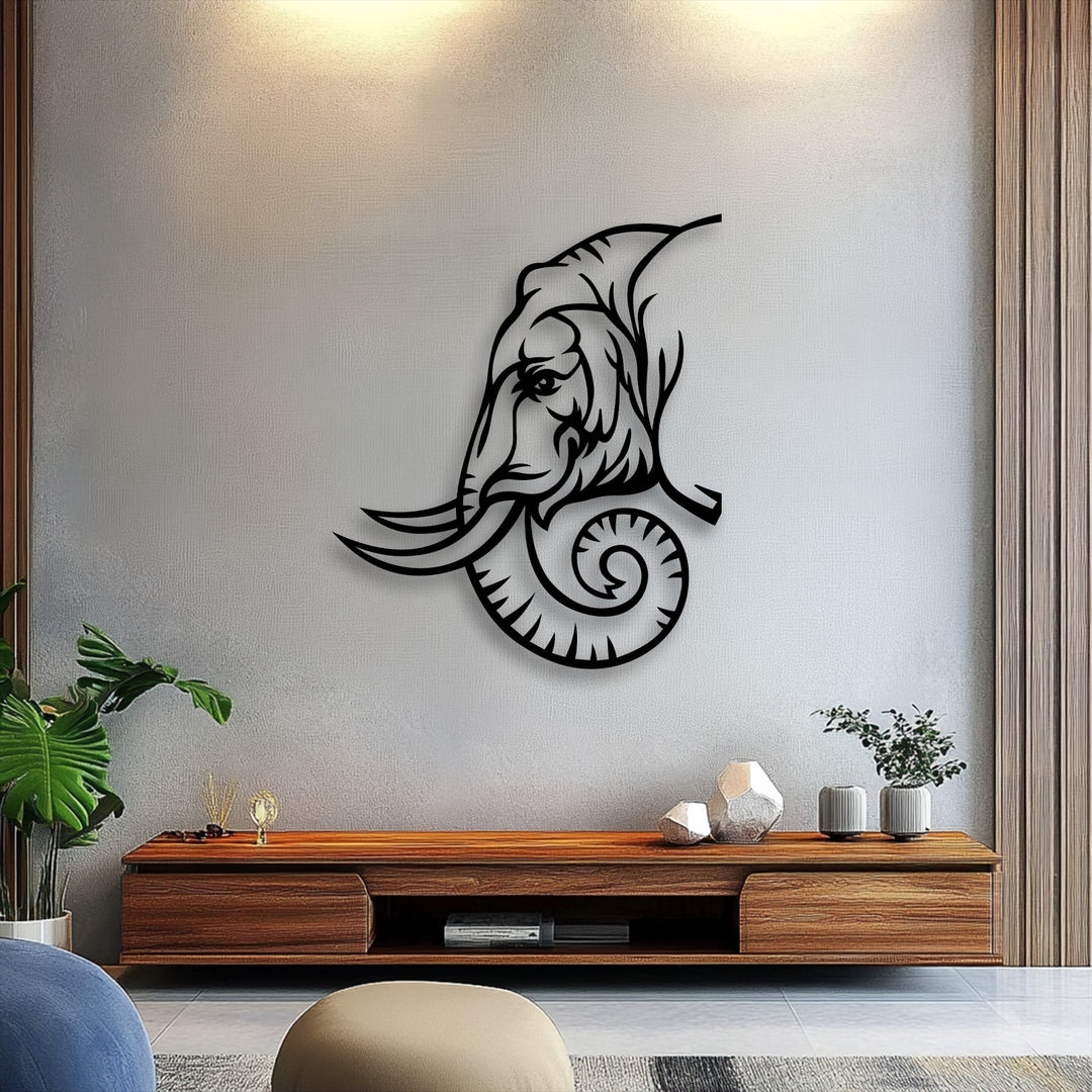 An upward-facing, abstractly shaped unique metal wall art depicts a majestic tribal-inspired elephant line art design.