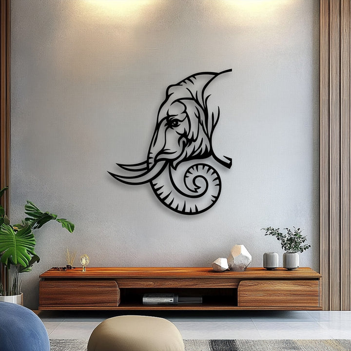An upward-facing, abstractly shaped unique metal wall art depicts a majestic tribal-inspired elephant line art design.