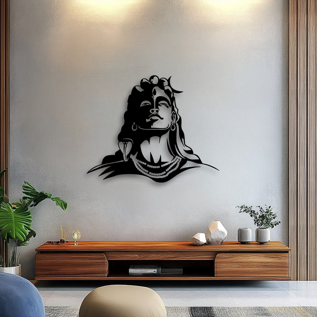 The warm color temperature of the ambient lighting accentuates the detailed Lord Shiva metal wall art, casting a serene glow on the space.