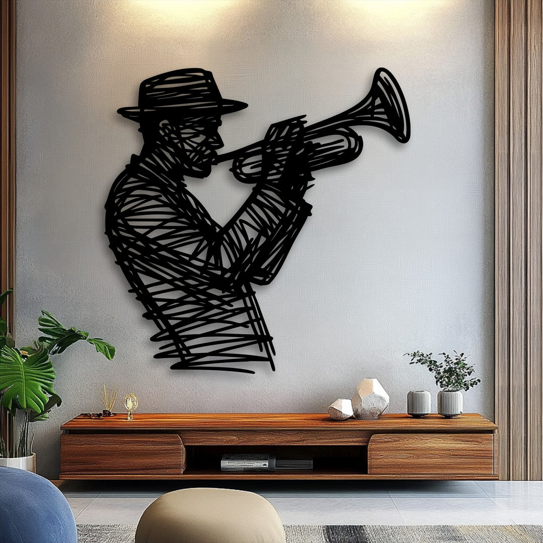 Light and shadow dramatically emphasize the jazz trumpet player silhouette of decorative metal art against a textured wall.