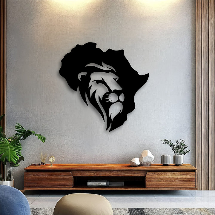 The subtle grainy texture of the wall provides a backdrop for the sleek matte finish of the Africa Map Lion Within Continent metal artwork.
