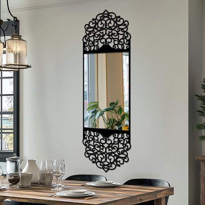 Negative space creates ornate patterns within this arabesque arch frame floor mirror's elegant black metal artwork design.