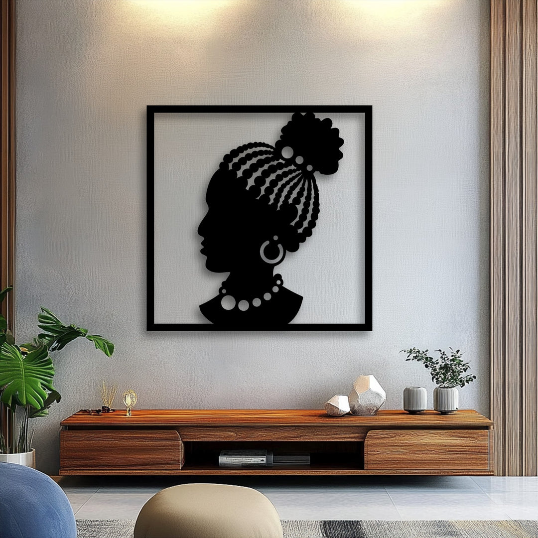 Displaying realistic detail, this elegant African woman metal artwork features intricate braided hair, a bun, hoop earring, and beaded necklace.