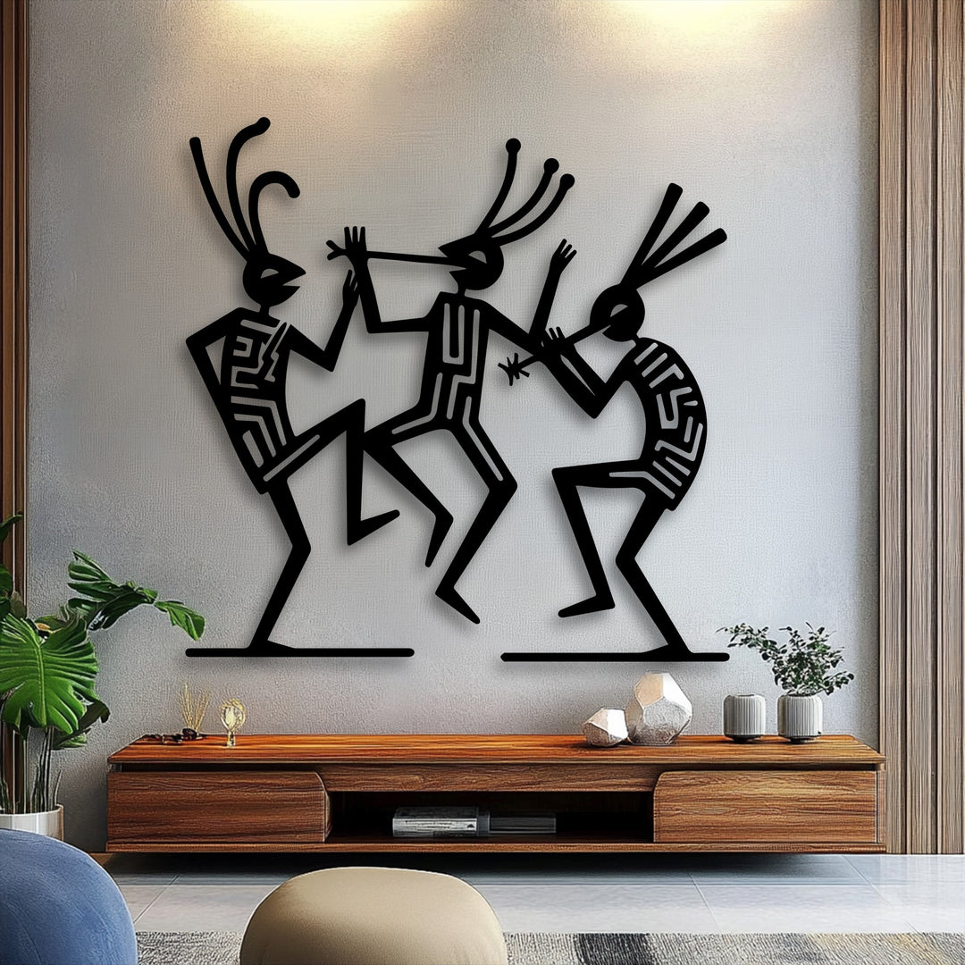 Abstract tribal dance figures captured in striking metal art for wall, showcasing cultural rhythm in a minimalist silhouette design.