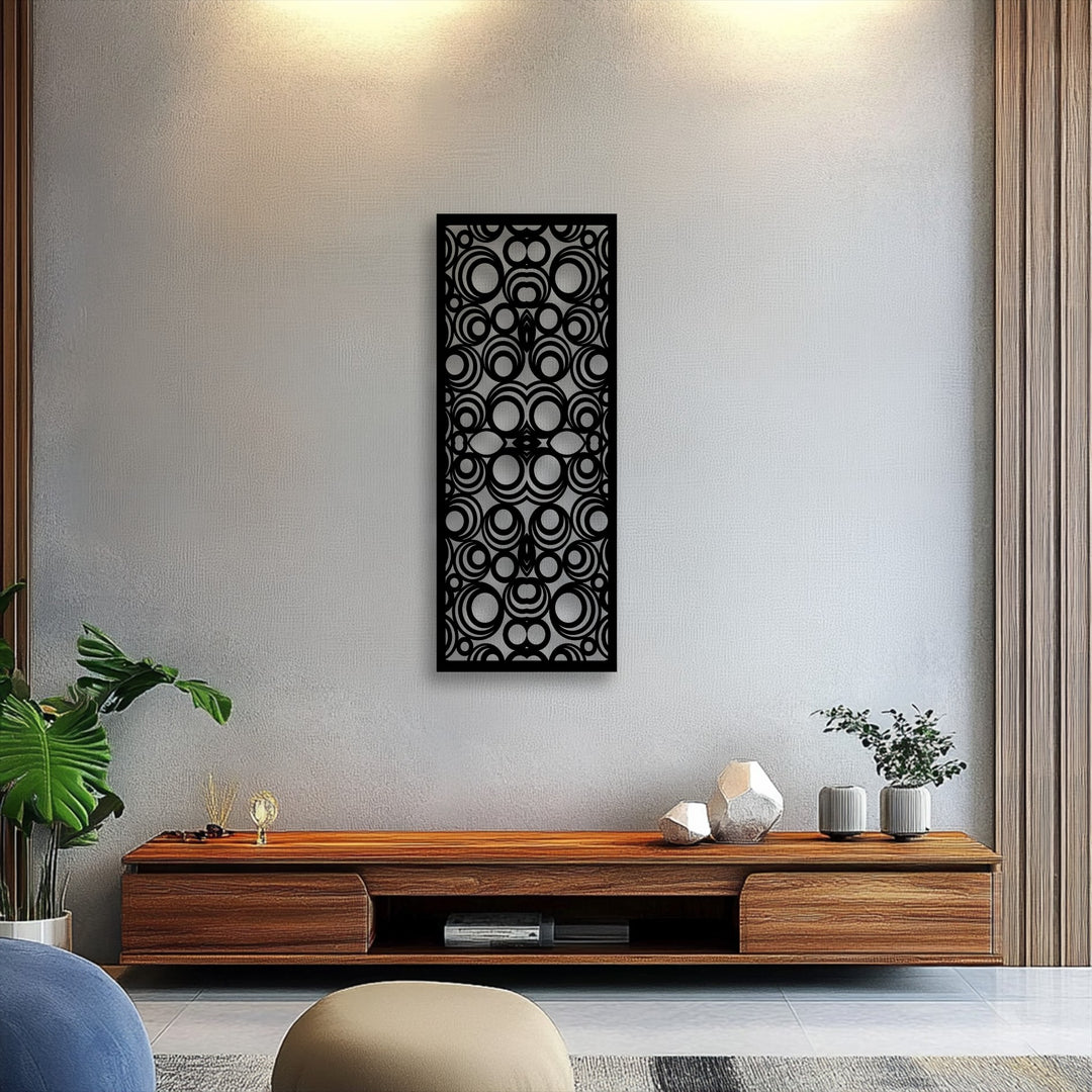 The forefront features a plush blue armchair and a light brown ottoman, complementing the elegant geometric circle pattern metal art for wall.