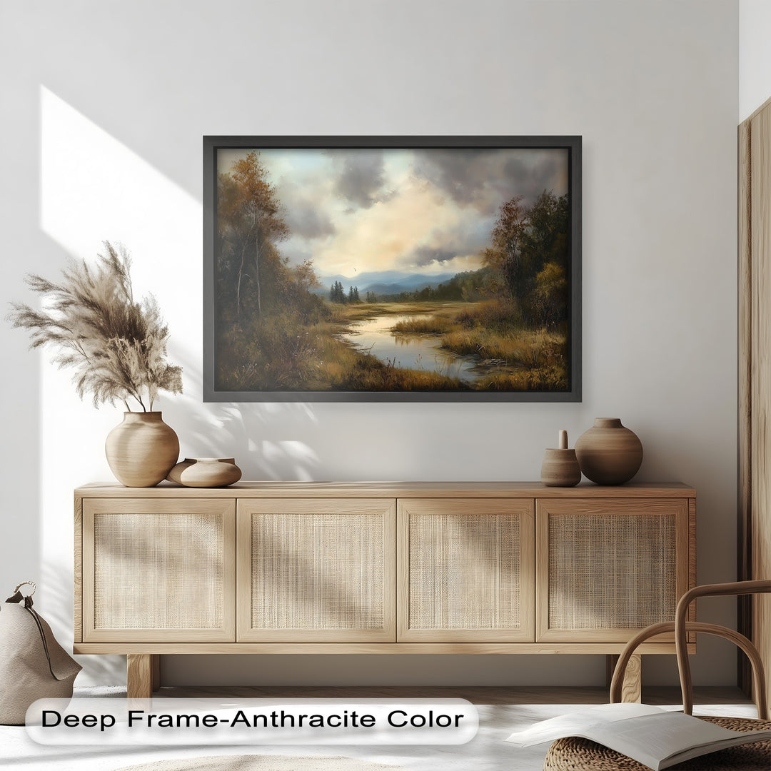 A peaceful autumn landscape with a winding stream flowing through golden grasses under a dramatic, cloud-filled sky.

