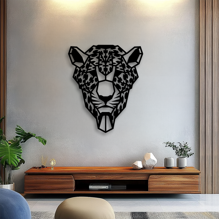 The unique metal wall art featuring a geometric tiger head is complemented by the flowing organic shapes of nearby plants.