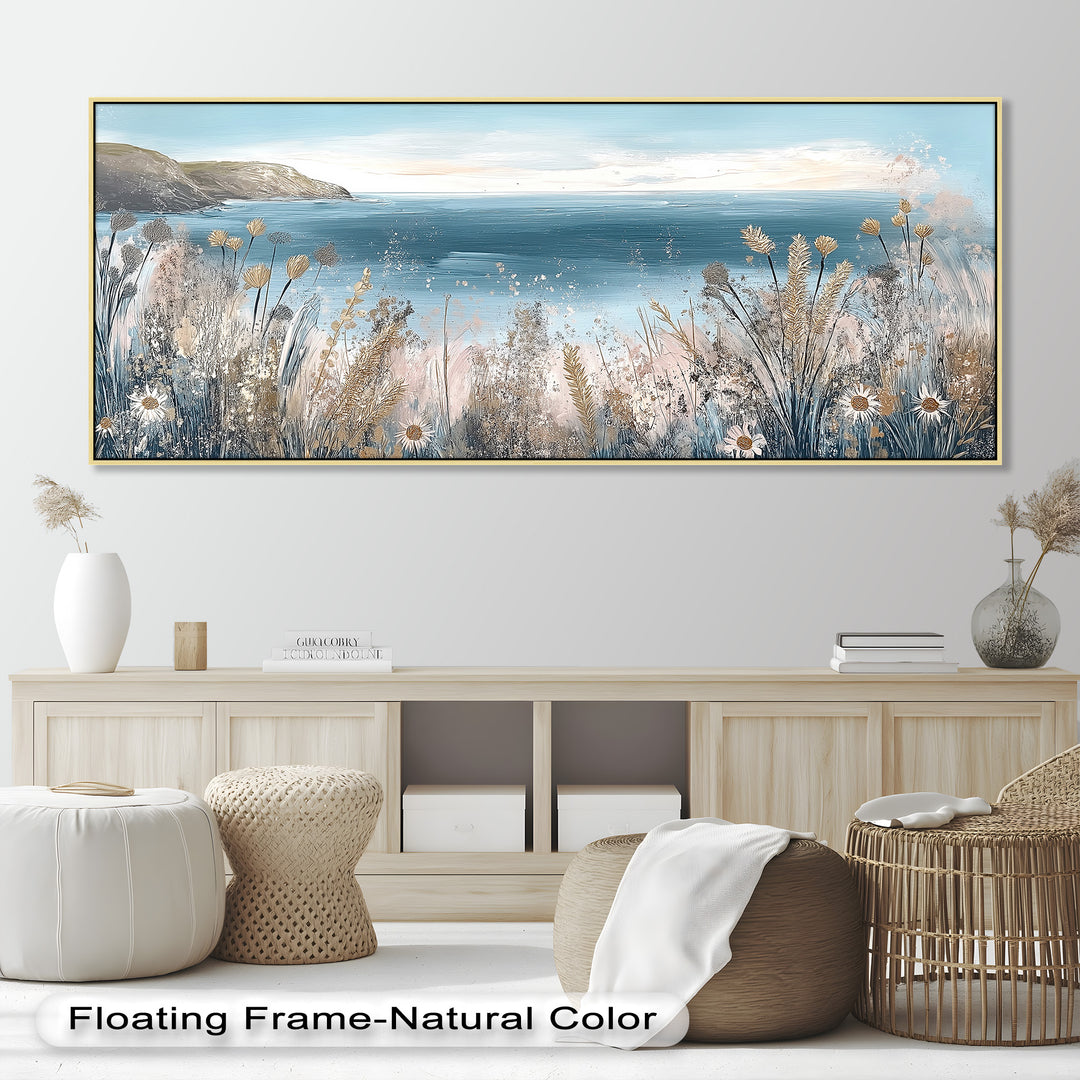 This cheerful coastal painting captures wildflowers and grasses swaying in the breeze, overlooking a bright blue sea and distant cliffs.