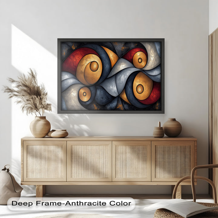 Bold geometric abstract painting with gold, silver, and deep red spirals.
