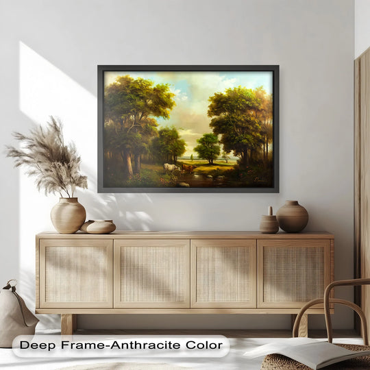 The stillness of a pastoral landscape captures vintage charm in this framed tranquil meadow with grazing cows oil painting art piece.
