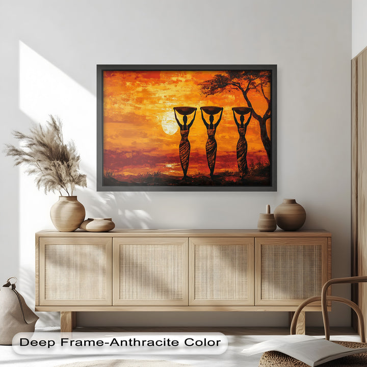 This vibrant painting captures three women in traditional attire carrying baskets at sunset, set against a glowing African landscape.

