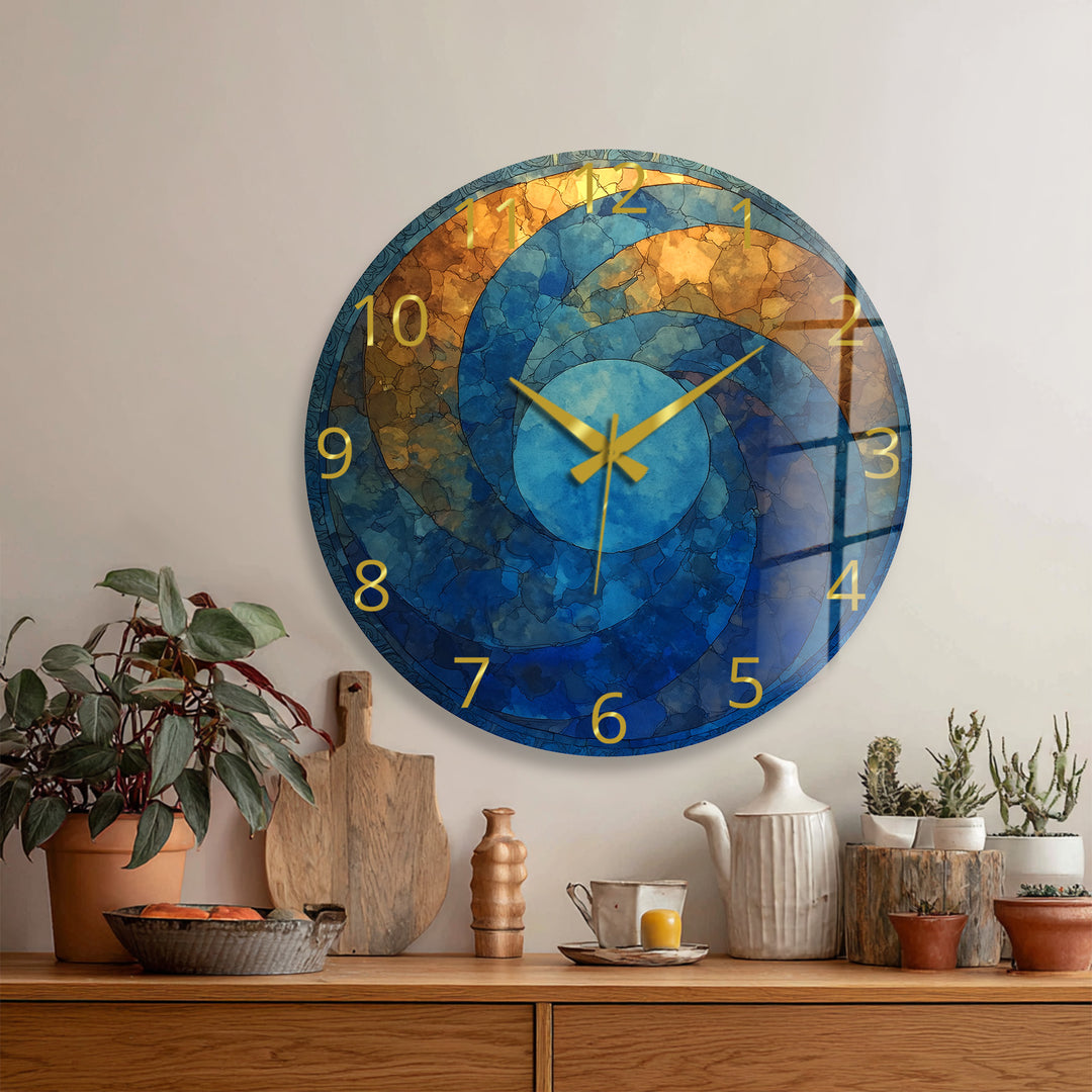 Blaue und goldene Glaswanduhr – abstraktes Kreisdekor