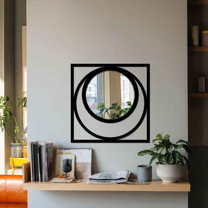 The stillness of the moment is captured in this modern black Eclipse square floor mirror, an example of artistic decorating with wall mirrors reflecting a calm interior scene.