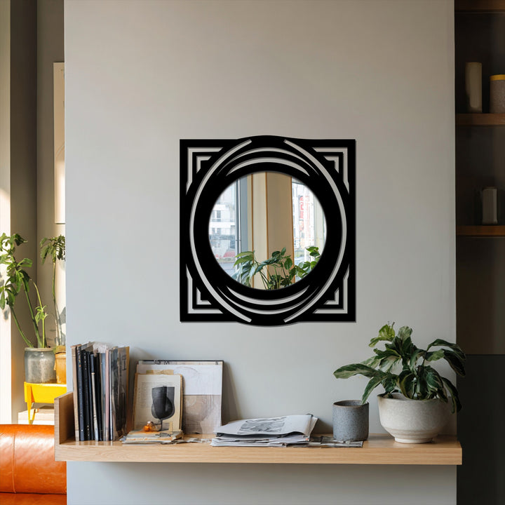 Featuring the decorative metal art, the Orbit Crest floor mirror showcases a durable black metal frame with a geometric design and high-quality mirrored surface.